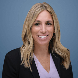 Woman's Headshot against Blue Background
