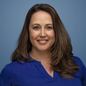 Woman's headshot against Blue Background