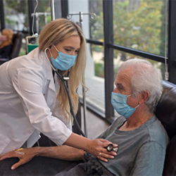 Nurse practioner examining patient